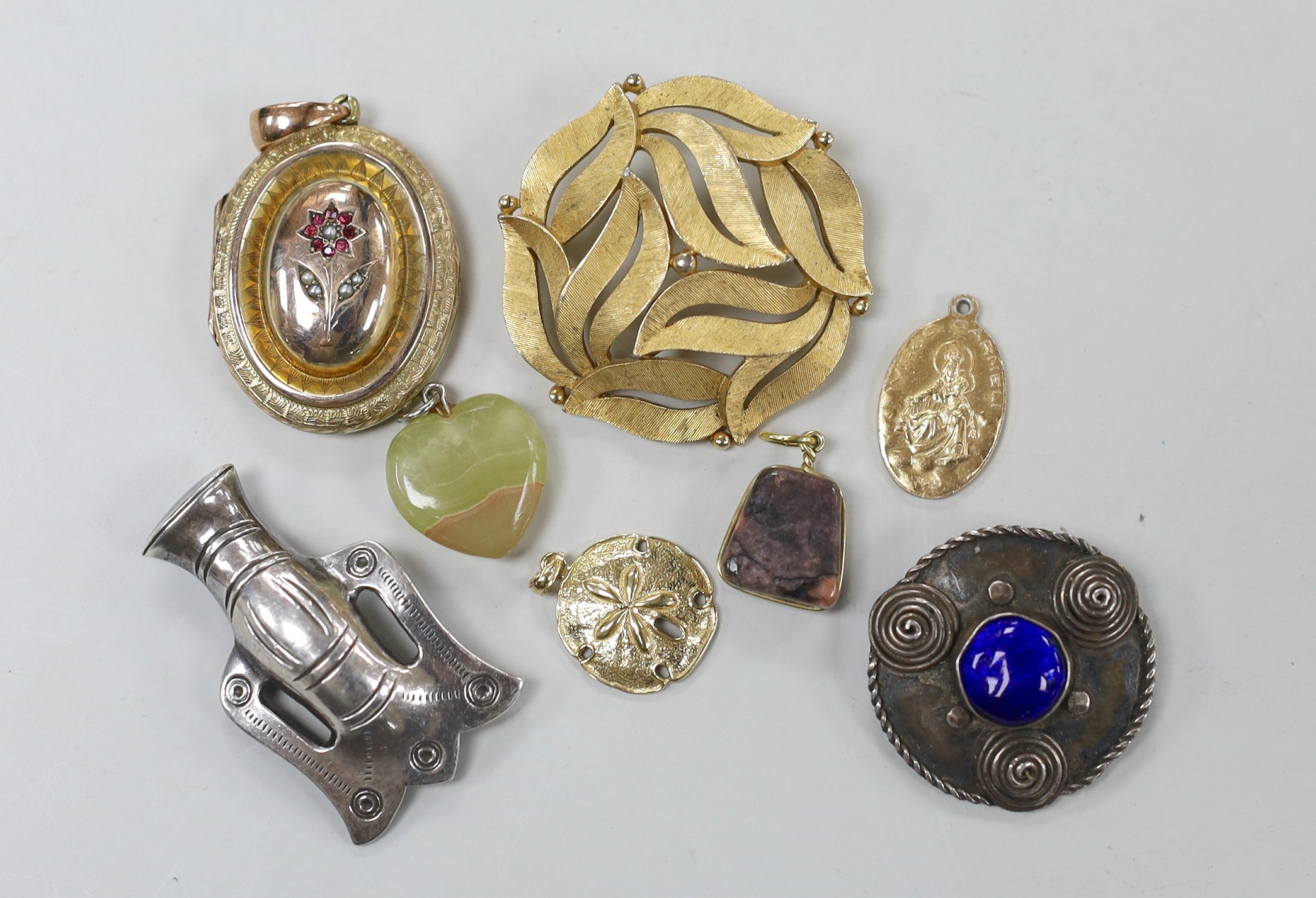A yellow metal, ruby and seed pearl set oval locket, overall 49mm and six other items of sundry jewellery.